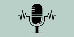 Microphone on a green background.